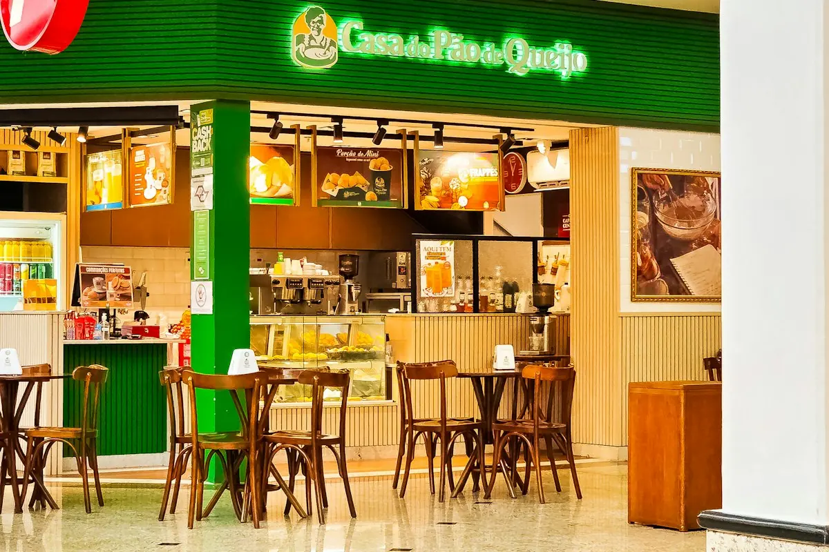 Cafe storefront with tables and chairs