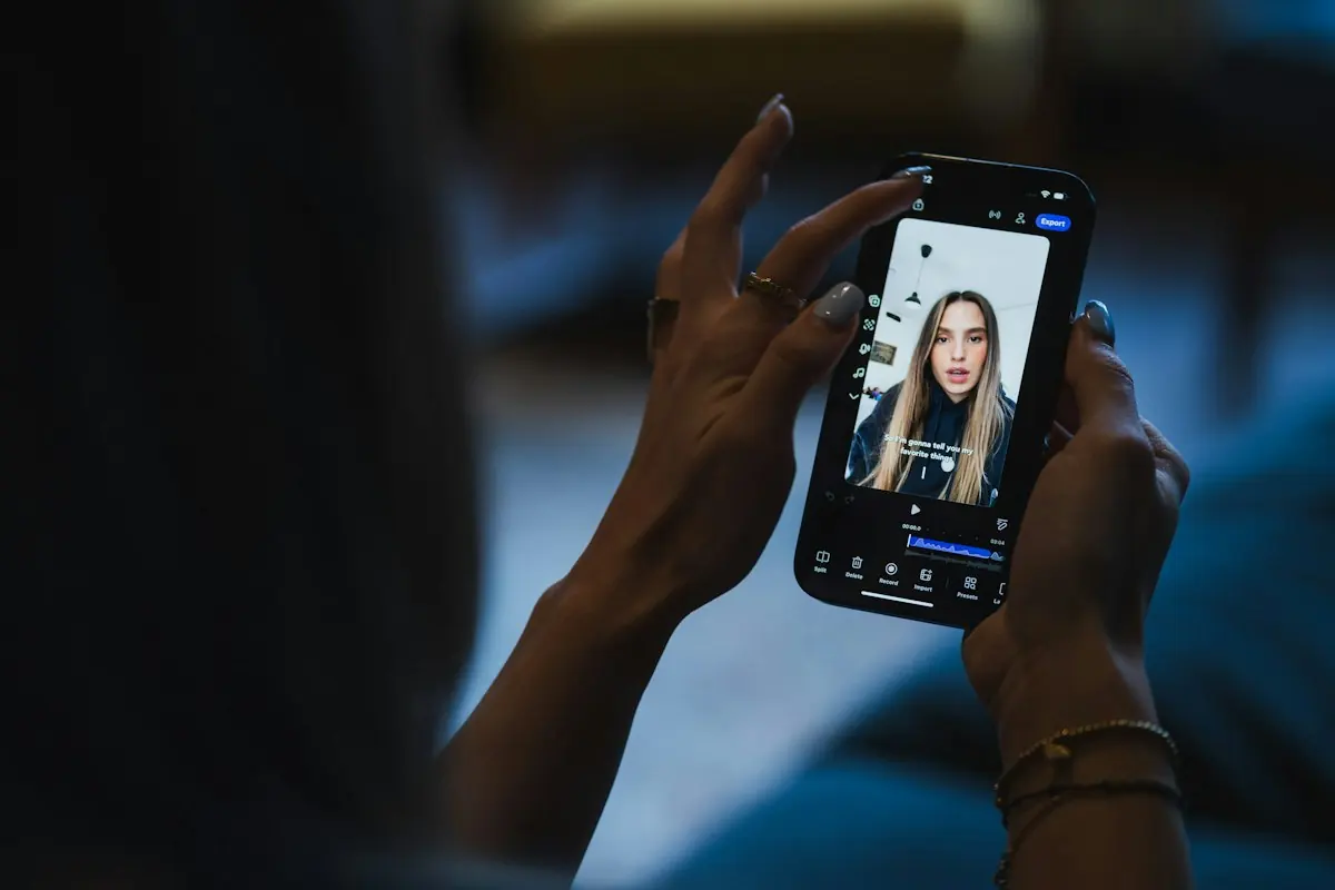 Person editing a talking-head video on a smartphone