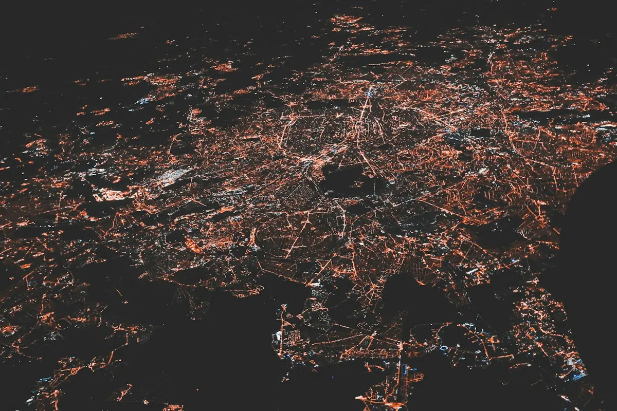 Aerial view of an illuminated urban street network