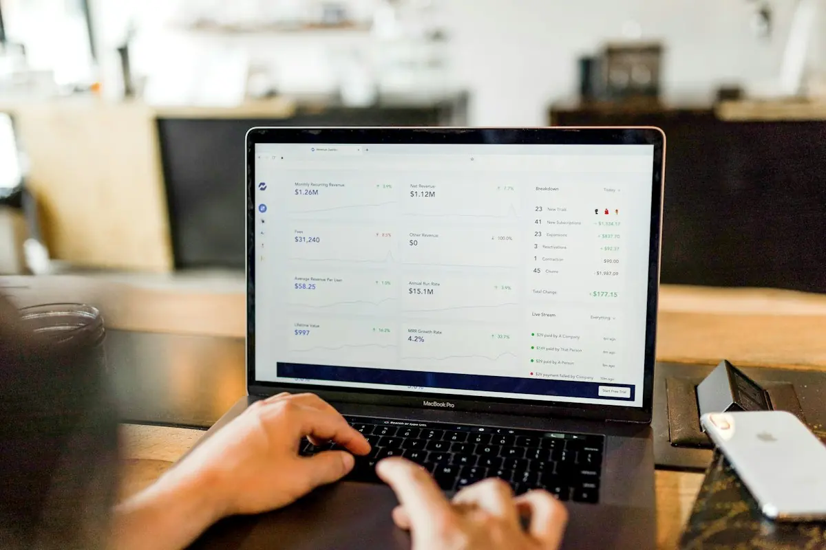 Person examining business analytics on a laptop